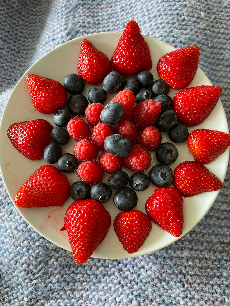 A spread of fresh berries — strawberries, blueberries and raspberries