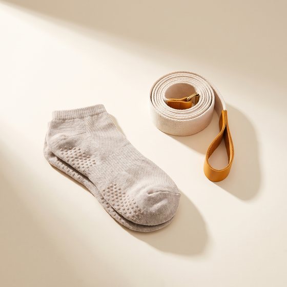 Pilates grip socks and mat strap